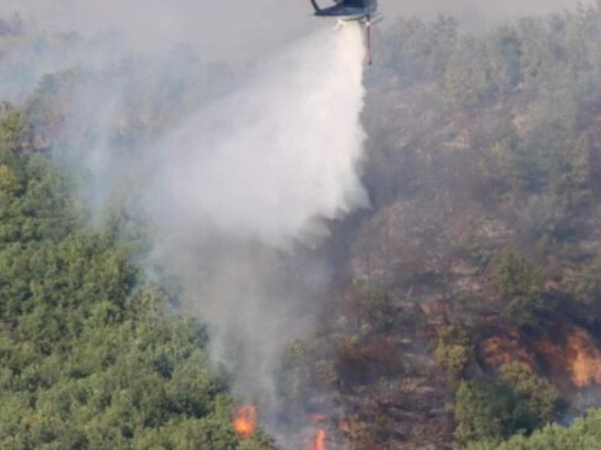 Me dy helikopterë po tentohet të shuhet zjarri në Ohër